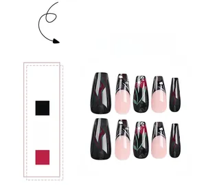 Detail of long coffin press-on nails with black pink marble art and glitter stars