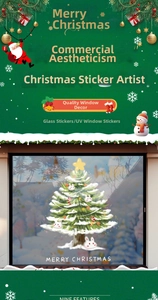 Close-up of static cling window decal featuring a snow-covered Christmas tree and cute bunnies