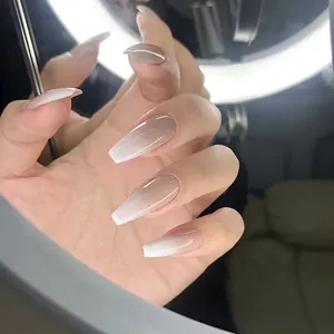 Long coffin gradient press-on nails with a glossy nude pink to white French finish