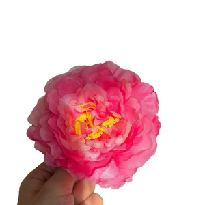 Pink artificial peony flower hair clip with layered petals and realistic yellow stamen