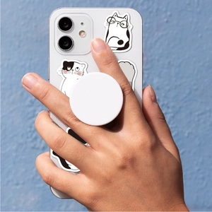 Universal white pop-up phone socket grip shown in use on a white smartphone