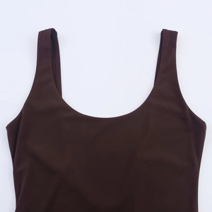 Detail view of chocolate brown mesh patchwork dress with ribbed stretch fabric