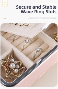Pink PU leather jewelry organizer box with soft velvet ring rolls and multi-functional slots