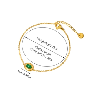 Detail of 18K gold-plated bracelet showing emerald green stone size and chain dimensions