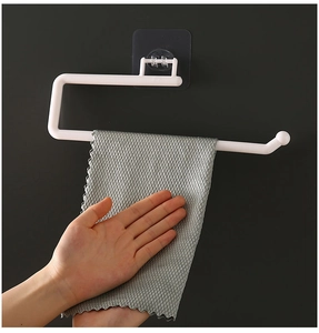 L-shaped wall-mounted white towel rack with adhesive backing shown in use in a kitchen