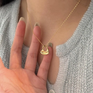 Minimalist 925 sterling silver golden heart pendant necklace with sleek curved design