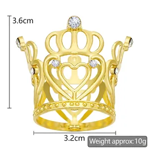Detail showing gold alloy mini crown with 3.6cm height, 3.2cm base and crystal rhinestones