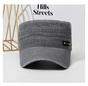 Detail view of washed cotton military flat top cap featuring sport leather patch with rivets