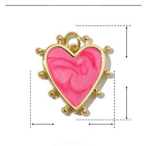 Detail view of pink enamel heart pendant with copper gold edges and precise size specs