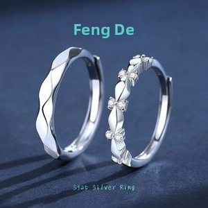 Detailed view of S925 silver wave texture ring and paved zircon matching wedding bands