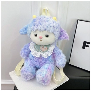 Detailed close-up of curly purple sheep plush backpack with green lace bib and yellow horns