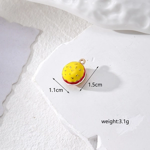 Detailed view of alloy burger pendant with 1.1cm x 1.5cm dimensions and 3.1g weight