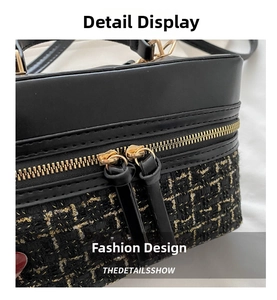Detailed view of the luxury tweed fabric with gold threads and high-quality double zippers