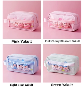 Detail of transparent window on canvas pencil case with cute plush drink charms inside