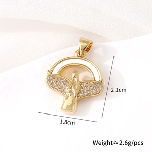 Close-up of oval gold-plated Virgin Mary pendant with dimensions 1.8cm x 2.1cm