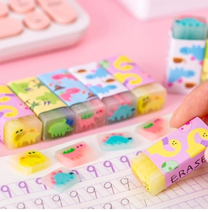 Detailed close-up of colorful translucent dinosaur jelly erasers in cute paper sleeves