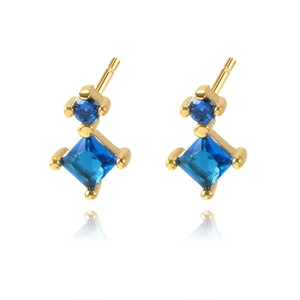 Elegant gold geometric earrings with blue zircon stars and sparkling tassel details