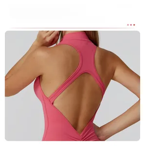 Macro detail of high-elastic pink yoga bodysuit featuring a hollow backless design