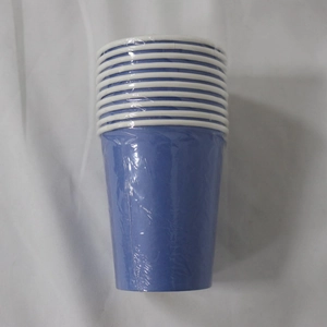 Close-up of blue paper cups stacked and wrapped in clear plastic film for parties