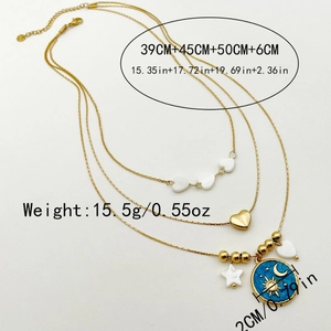 Three-layer vintage gold celestial necklace with blue enamel sun moon star pendant