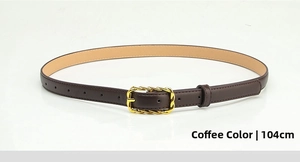 Detail of coffee brown PU leather belt with a decorative gold alloy twisted buckle