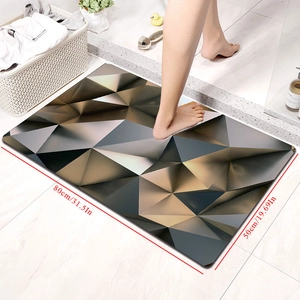 Detailed view of geometric diatom mud mat with 3D triangle pattern and 80x50cm dimensions