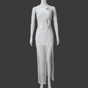 Detail view of white knitted cutout dress with metal ring and asymmetric halter neck