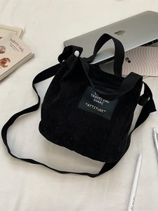 Mini sac seau vintage en velours côtelé noir avec bandoulière et fermeture à pression
