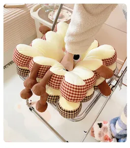 Detail of plush flower seat cushion showing the soft rebound after hand pressing