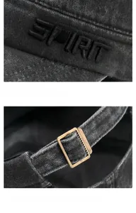 Detail of SPIRIT embroidery and metal adjustment buckle on washed denim flat top cap