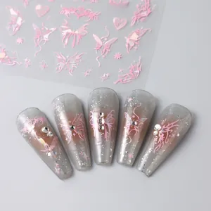 Detail of 3D laser silver butterfly nail stickers with pink aurora effect and rhinestones