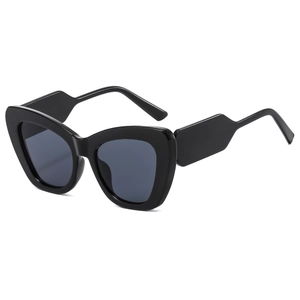 Fashionable oversized cat-eye sunglasses with glossy black frame and dark grey lenses