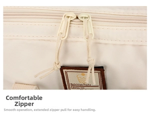 Macro detail of waterproof diaper bag showing durable dual zippers and nutrition label