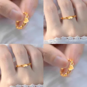 Elegant gold chain ring featuring a polished heart charm pendant for women and girls