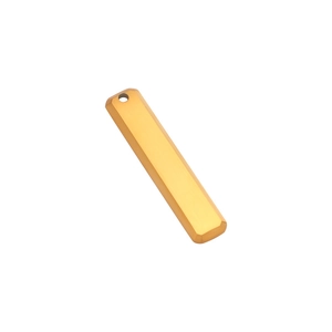 Macro view of golden stainless steel rectangular bar pendant with faceted geometric edges