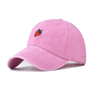 Close-up of pink washed cotton strawberry embroidery on vintage baseball cap