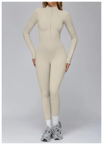 Detail of high-stretch beige yoga bodysuit with stand collar and front zipper