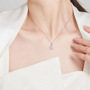 Elegant S925 sterling silver necklace with pink square ice cut pendant on model