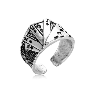 Macro detail of retro poker card ring featuring vintage silver finish and adjustable band