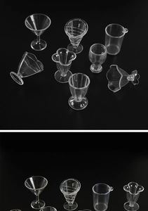 Macro shot of assorted miniature transparent resin glasses for DIY dollhouse crafts