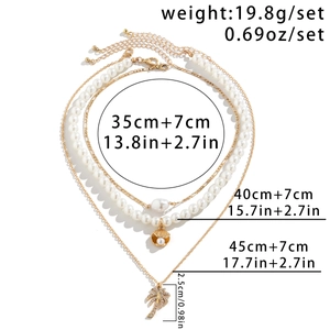 Multi-layer pearl necklace with starfish and shell charms, including size and weight specs