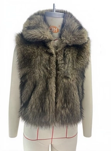 Detailed view of the soft faux fur texture and large lapel of this brown cropped vest