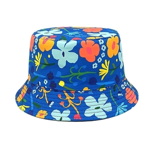 Detail of navy blue kids bucket hat with vibrant floral print and reinforced stitching