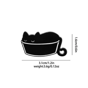 Detail view of cartoon black cat enamel pin with dimensions 3.1cm width and 3.6g weight