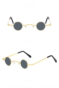 Detail view of retro punk gold metal sunglasses with round grey lenses from multiple angles