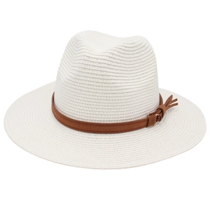 Detail of cream Fedora straw hat featuring a brown leather band and gold metal hardware