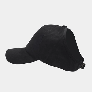 Detail of black ponytail baseball cap showing open back design and adjustable strap