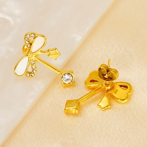 Golden stainless steel bow earrings with white enamel and sparkling zircon stones