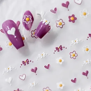 5D embossed nail art stickers featuring purple daisies, hearts, and gentle cute motifs