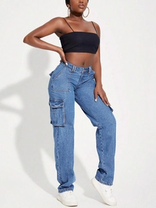 Detail of cargo pockets and stitching on vintage blue straight leg denim trousers